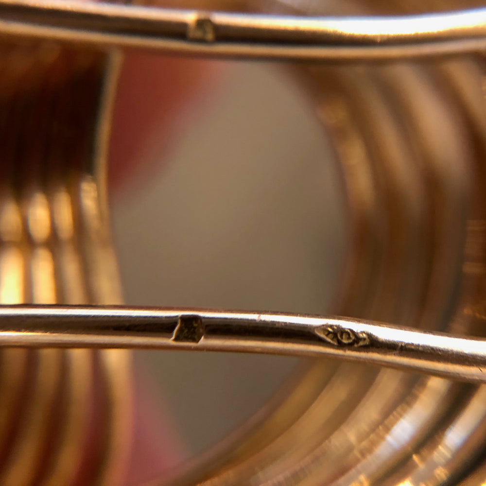 
                      
                        Macklowe Gallery Cartier Gold and Diamond Swirl Brooch
                      
                    